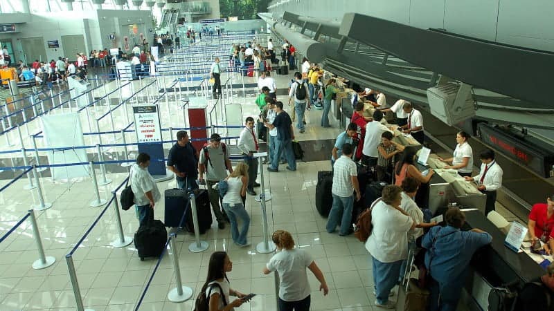 A large group of people in the Guanacaste airport in Costa Rica.