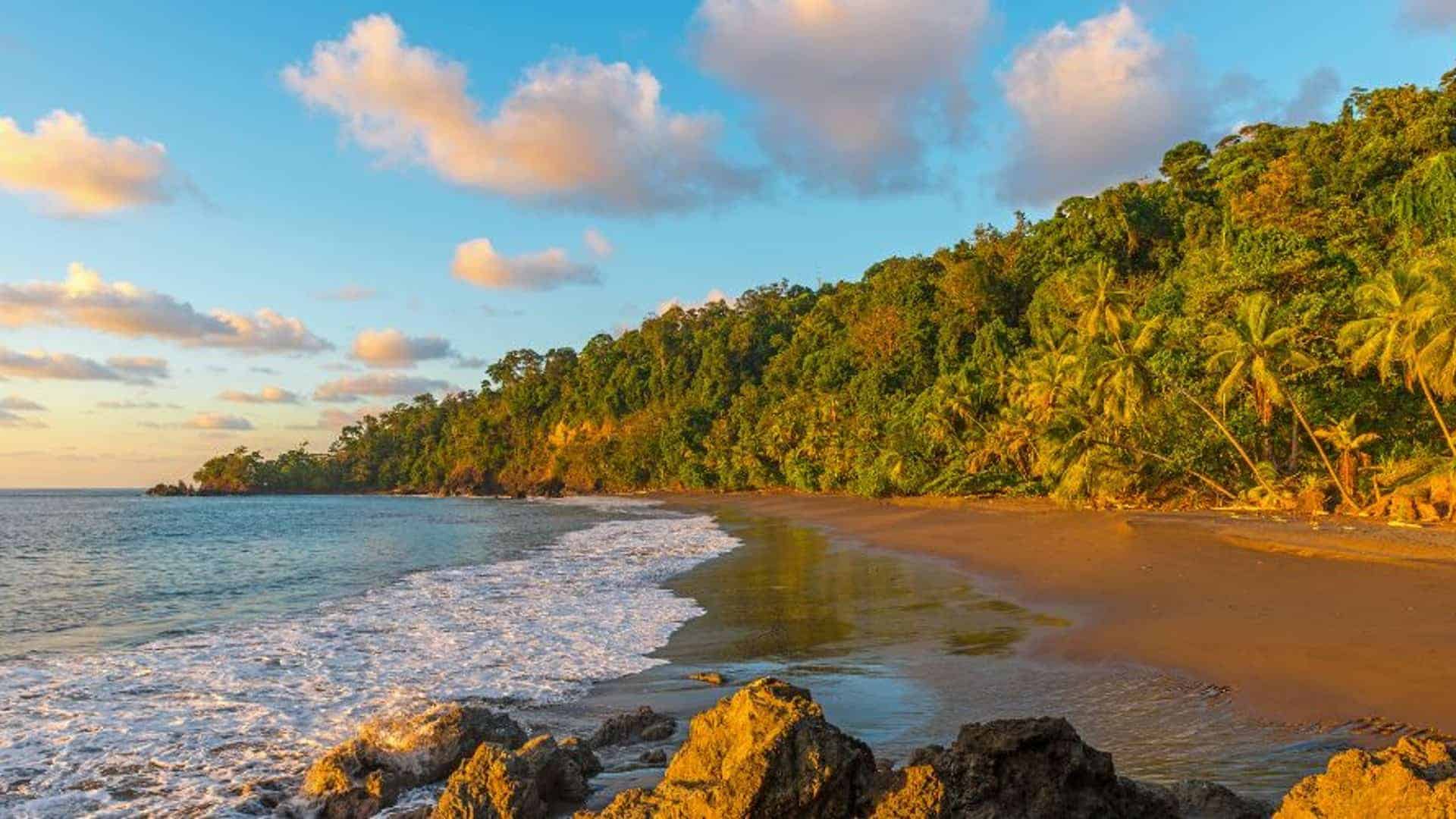 Sunset along the Pacific Coast of Costa Rica in the Osa Peninsula inside the Corcovado National Park with a view over the tropical rainforest.